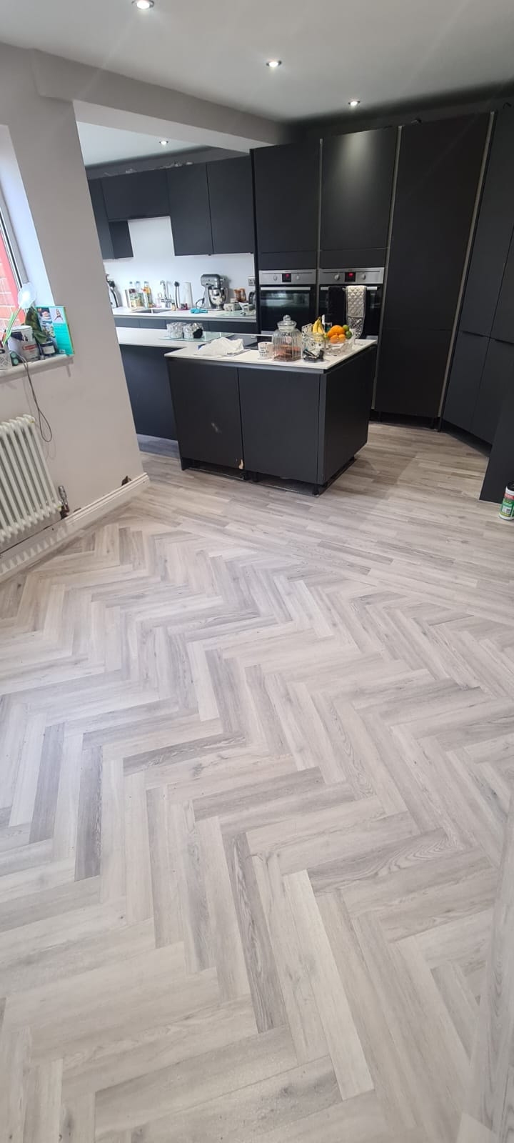 Luxury vinyl tile flooring in a contemporary kitchen